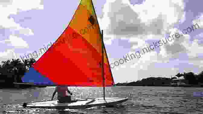 A Young Boy Sails A Sunfish Sailboat Towards A Remote Island Second Wind: A Sunfish Sailor An Island And The Voyage That Brought A Family Together